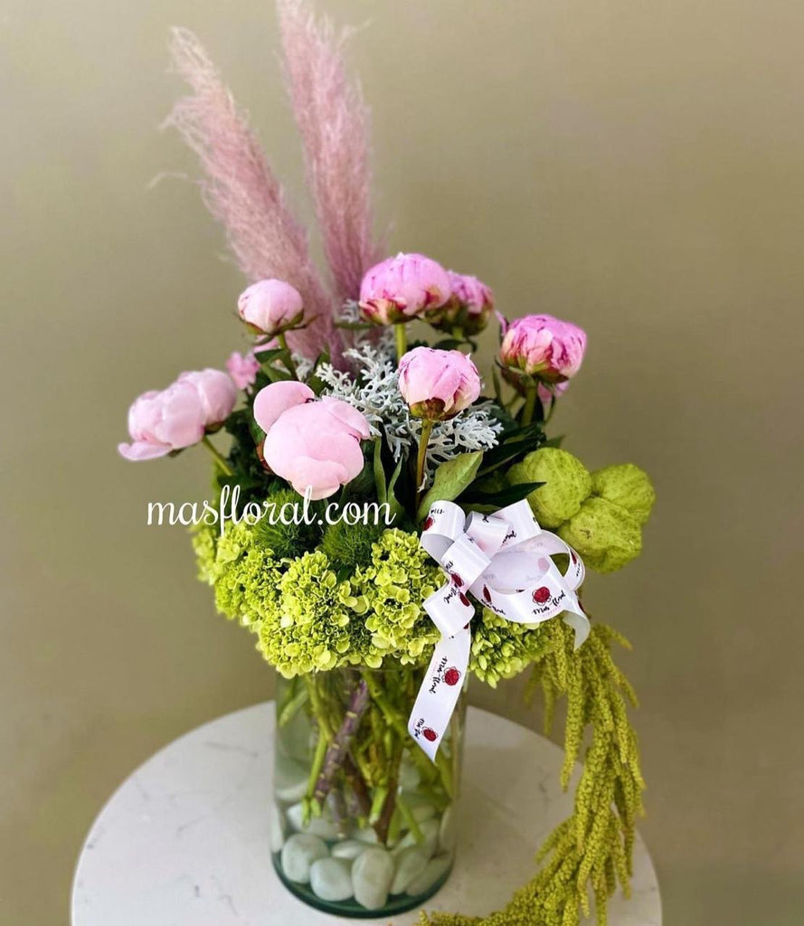 Peonias y follajes